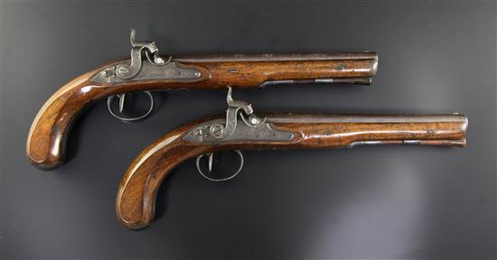 A pair of early 19th century percussion lock pistols, by Wogdon of London, 14in.